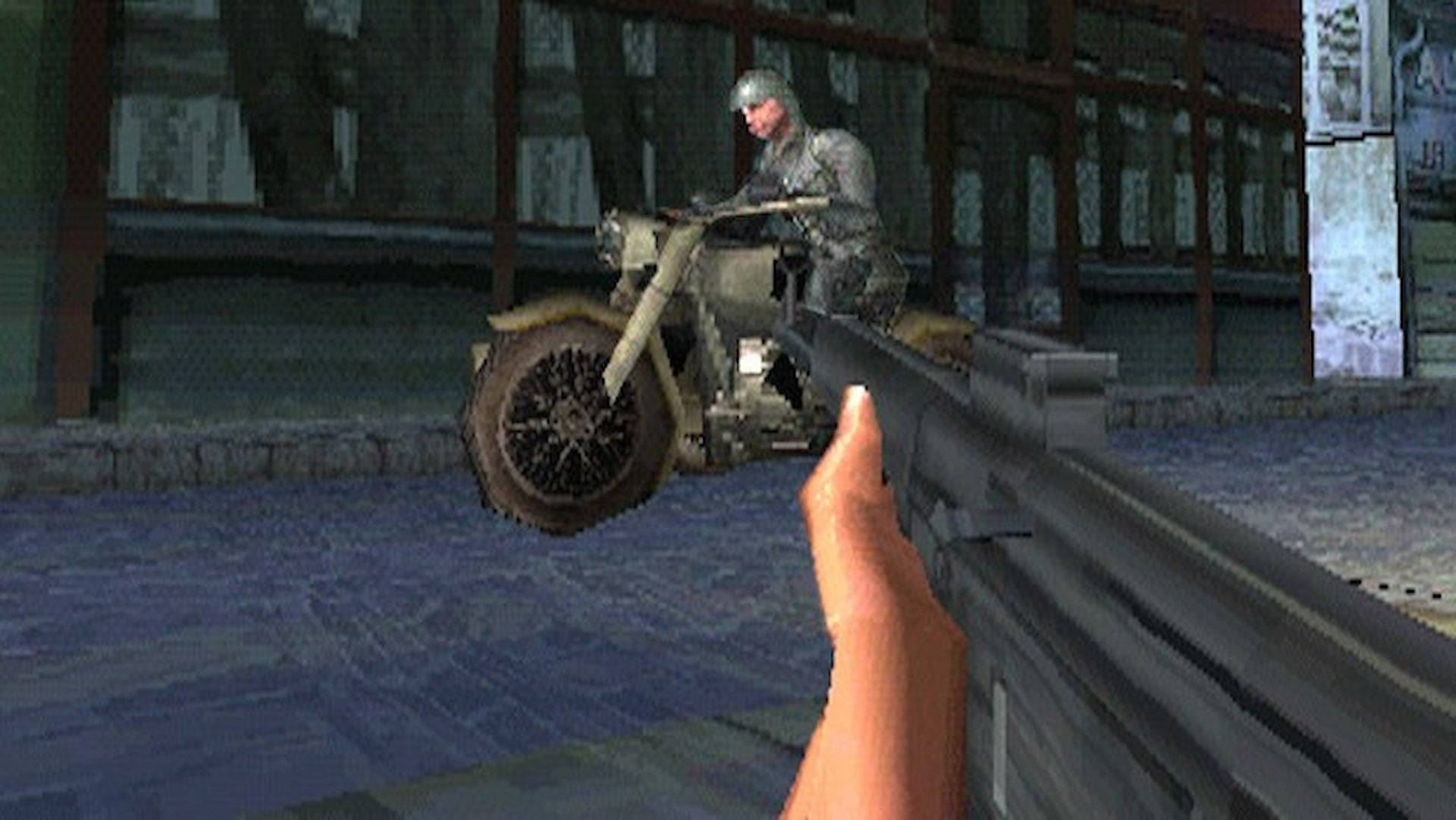 The player points a gun at a Nazi on a motorbike