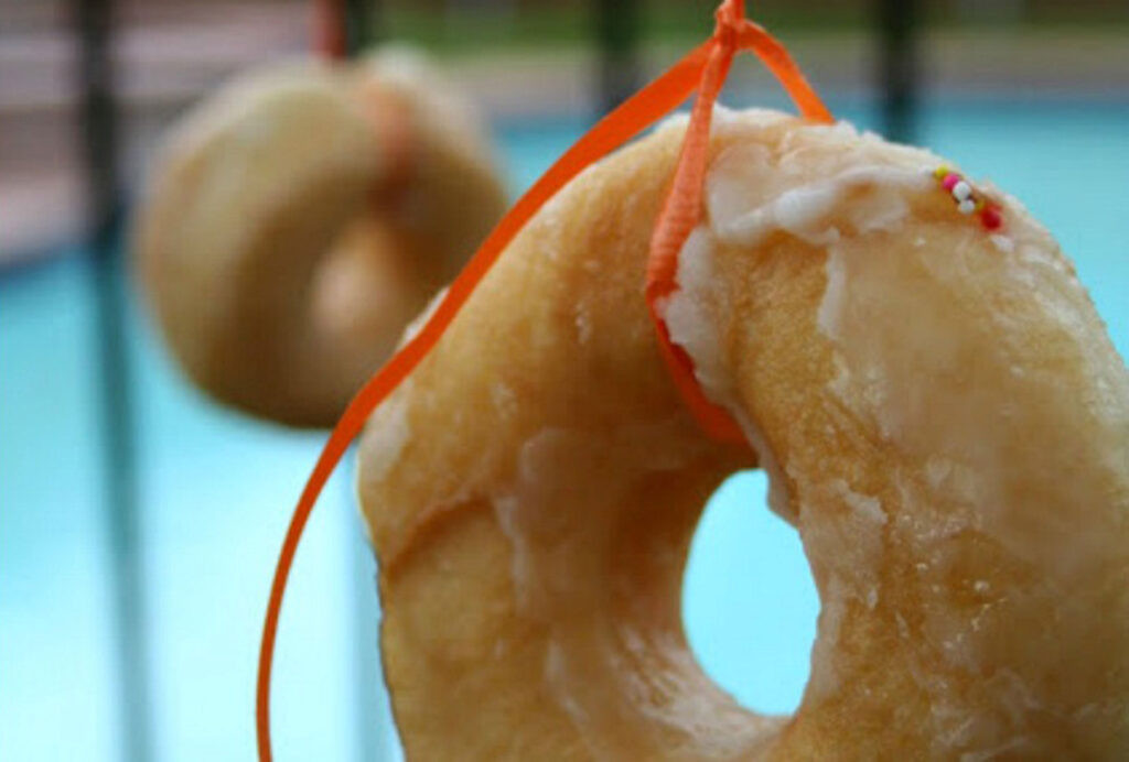 Donut on a string game is perfect for birthday parties.