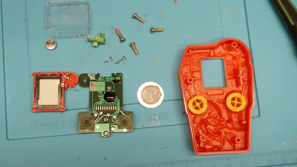 Inside components and case of McDonalds Sega Knuckles Soccer handheld LCD Game