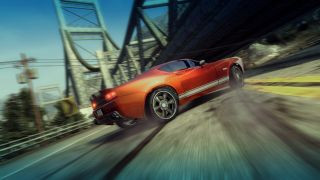 An orange car racing during Burnout Paradise, one of the best PS3 games.