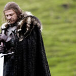 Sean Bean as Eddard Stark in Game of Thrones, looking serious and noble