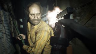 Resident Evil 7 screenshot of enemy Jack Baker lunging at Ethan Winters with a pole-like melee weapon as Ethan shoots him
