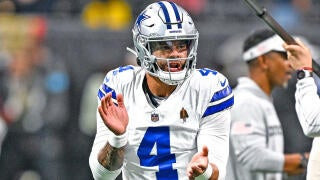 Dak Prescott at Cowboys OTAs, a key player whose performance impacts the team's success.