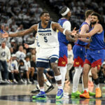 Anthony Edwards (5) of the Minnesota Timberwolves reacts to fouling Jamal Murray (27) of the Denver Nuggets during the second quarter at Target Center in Minneapolis, Minnesota on Friday, May 10, 2024