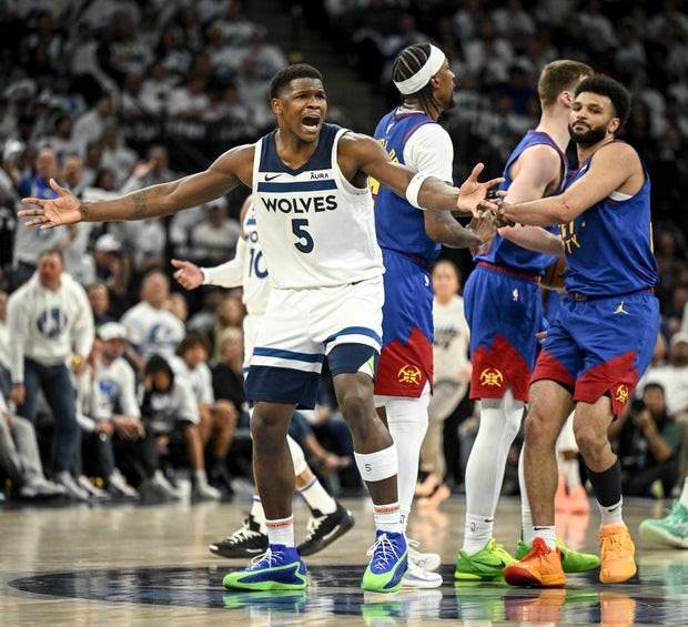Anthony Edwards (5) of the Minnesota Timberwolves reacts to fouling Jamal Murray (27) of the Denver Nuggets during the second quarter at Target Center in Minneapolis, Minnesota on Friday, May 10, 2024