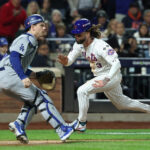 Jesse Winker Scores Against the Dodgers