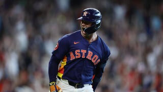 Christian Walker celebrates after hitting a walk-off home run against the Mariners