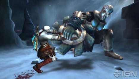 Kratos bathed in blood during battle in God of War Ghost of Sparta