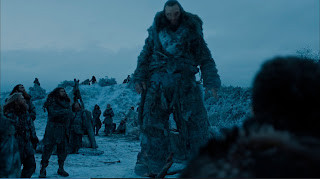 Wun Weg Wun Dar Wun in Game of Thrones, imposing figure and size, next to Jon Snow.