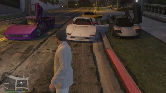 A man standing in front of three high-end sports cars displays GTA mods: single player cars.