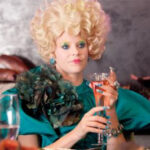 Elizabeth Banks as Effie Trinket