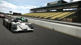 A white racing car zooming on a racing track in one of the best PS2 games, Gran Turismo 4.