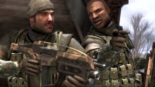 Battlefield: Bad Company screenshot showing two soldiers in a vehicle pointing at the camera