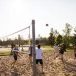Group playing 9 square