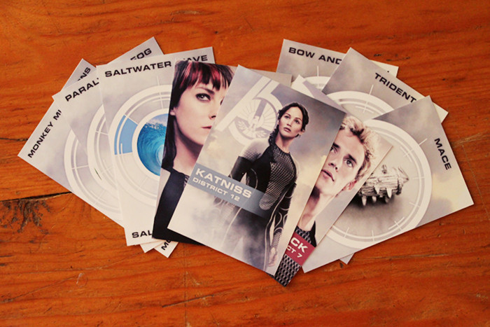 Detailed game cards designed for the custom Hunger Games Clue board game