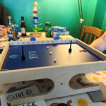 Klask game on a table