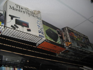 Shelves filled with various retro video games at Classic Game Junkie