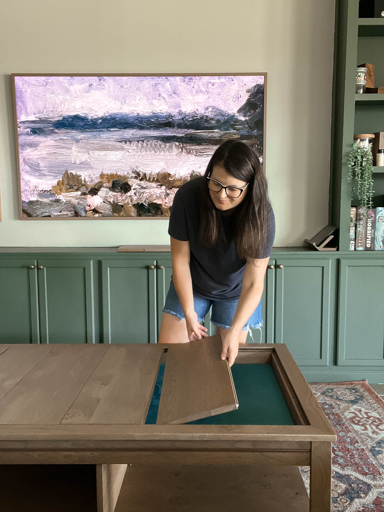 Game coffee table with hidden storage
