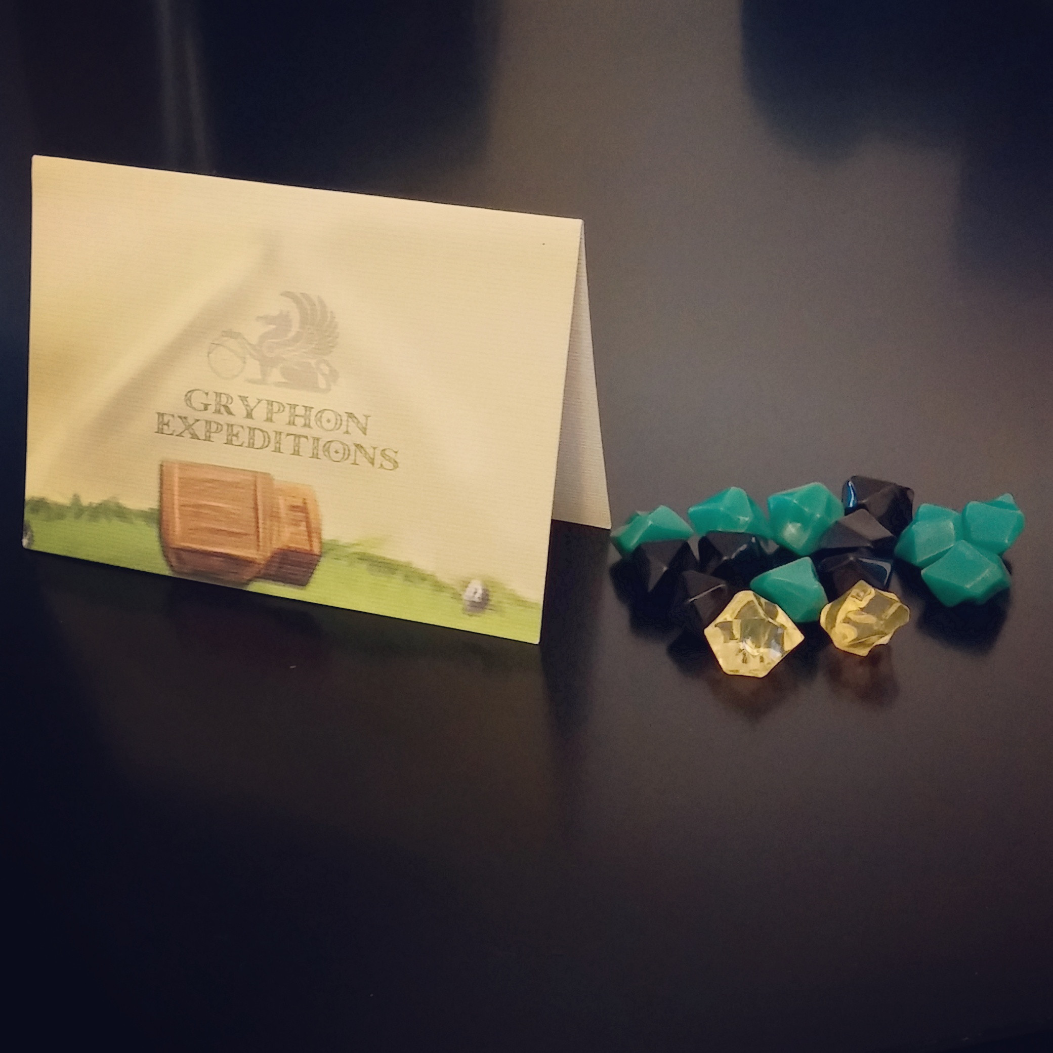 Each player receives a tent, where you can store your gems if you leave the temple safely.
