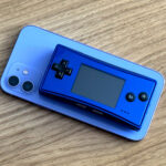 A Game Boy Micro on top of an iPhone