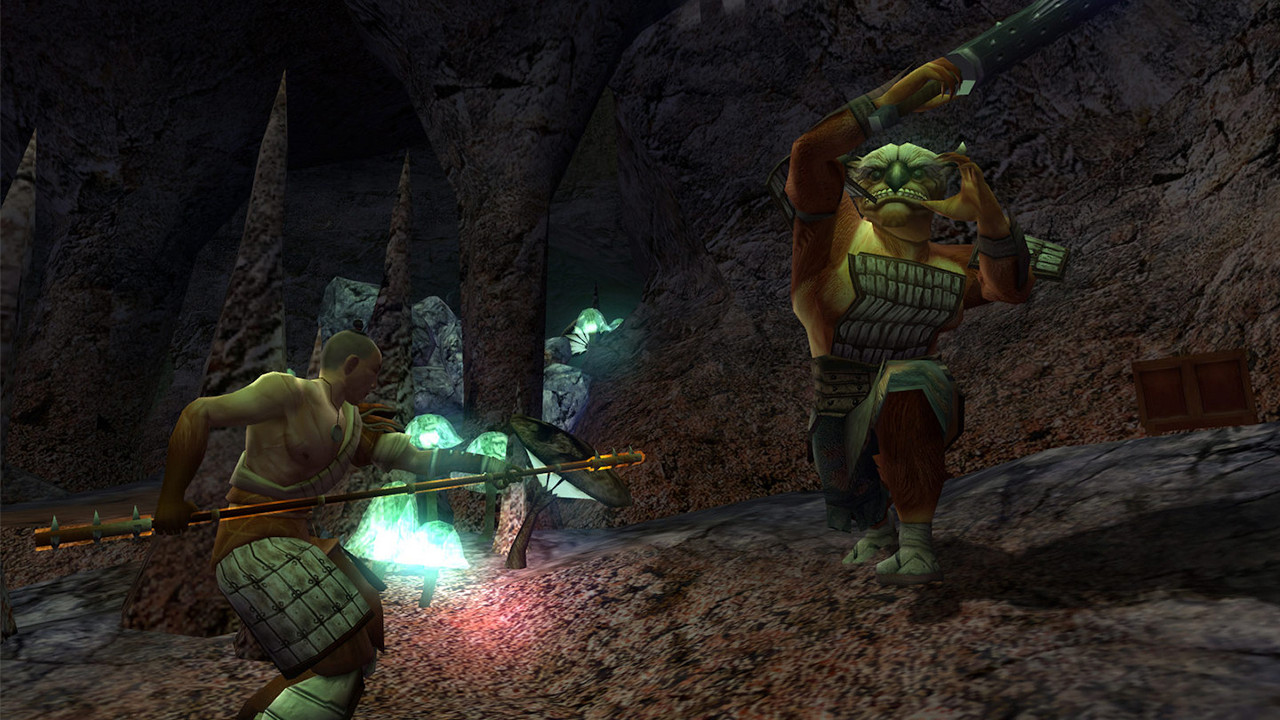 A creature lifts its weapon to attack a man in Jade Empi