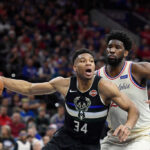 Giannis Antetokounmpo defended by Joel Embiid during the 2019 Christmas Day game