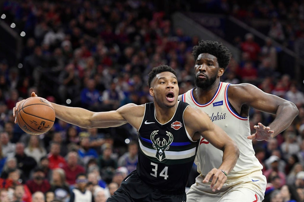Giannis Antetokounmpo defended by Joel Embiid during the 2019 Christmas Day game