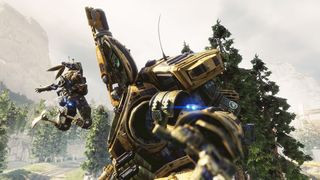 Titanfall 2 screenshot of a small mech-like character flying through the air at a far larger mech in a leafy green environment