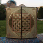Elegant golden Persian marquetry backgammon and chess board, handcrafted with traditional techniques for the ultimate luxury gaming experience. History of Board Games