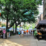 People strolling and eating in Market Square in Knoxville, Tennessee