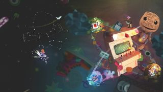 LittleBigPlanet 2 artwork showing Sackboy perched on an arcade machine