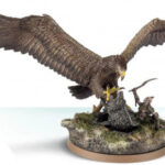 Middle Earth Strategy Battle Game miniature - Gwiahir the Wind Lord, a huge eagle, his wings spread, pins a Warg to the floor, dismounting its Orc rider