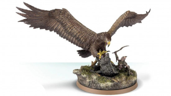 Middle Earth Strategy Battle Game miniature - Gwiahir the Wind Lord, a huge eagle, his wings spread, pins a Warg to the floor, dismounting its Orc rider