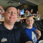 Michael with youngest son Carter @ Ball Arena