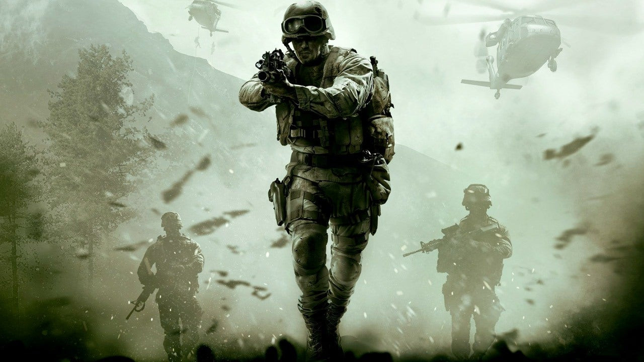 Soldiers running as a helicopter flies overhead