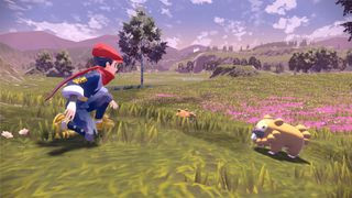 A trainer in Pokemon Legends Arceus catching a Pokemon in the wild