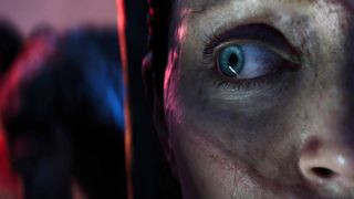 Senua in a dark cave during Senua's Saga: Hellblade 2, an Xbox exclusive game, highlighting the game's intense atmosphere