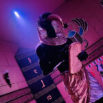 Imposing statue of Thoth in an Egyptian tomb, highlighting the attention to detail in the escape room's set design.