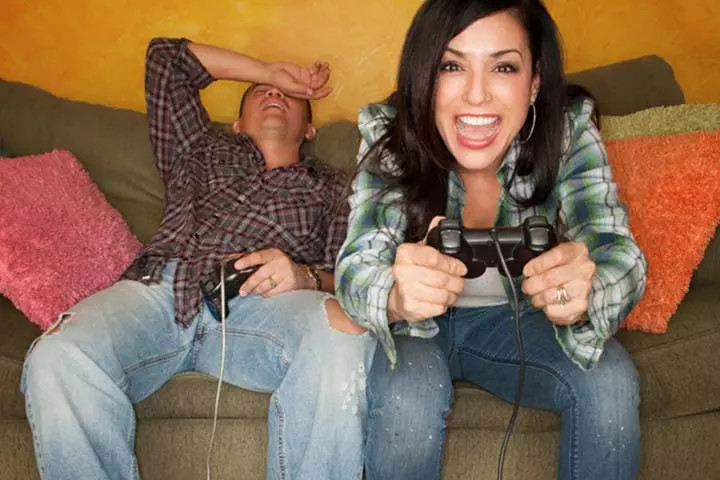 partners enjoying video game