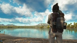Far Cry 6 screenshot of a character with their back to the player, facing a large lake and wearing an oxygen tank.