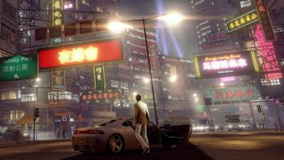 Sleeping Dogs: Definitive Edition presents a stylish scene with a man in a white suit standing next to a car in a vibrant, neon-lit city, showcasing the game's immersive Hong Kong setting.
