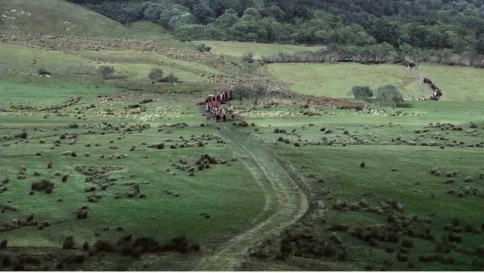 A medieval-style retinue accompanying a king, similar to Robert Baratheon's procession to Winterfell