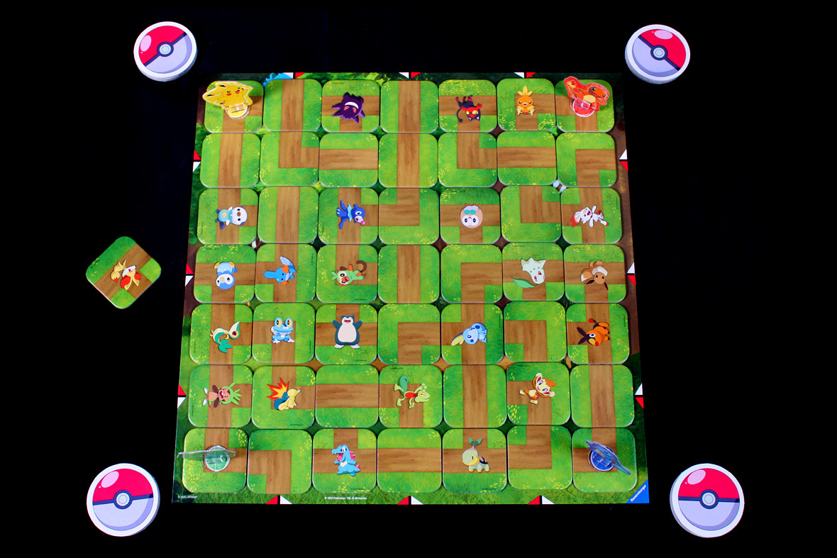 Pokémon Labyrinth setup with board, standees, tiles, and Poké Ball tokens