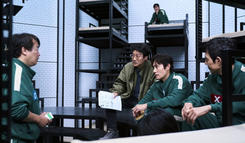 Director Hwang Dong-hyuk with Lee Jung-jae and Lee Byung-hun on the set of Squid Game Season 2