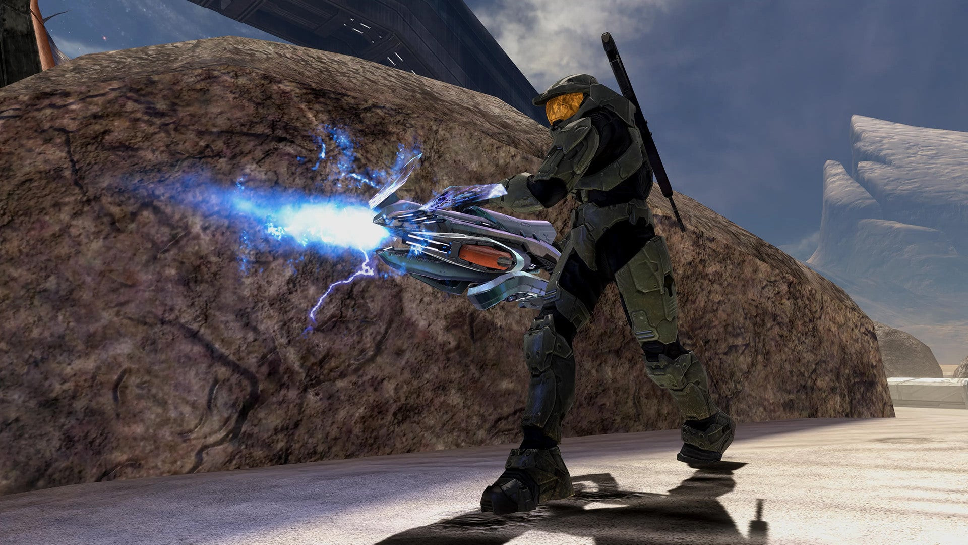 A Spartan shoots a laser weapon in Halo 3