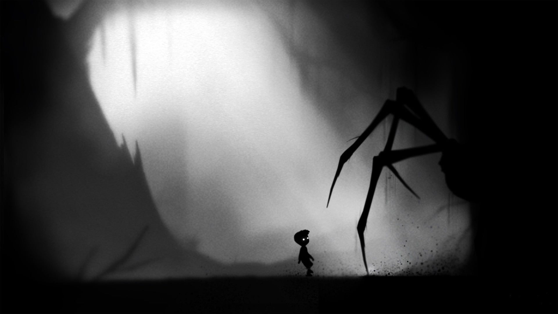 The silhouette of a boy and a large spider in Limbo