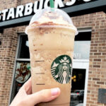 Starbucks Rewards card and app on a smartphone