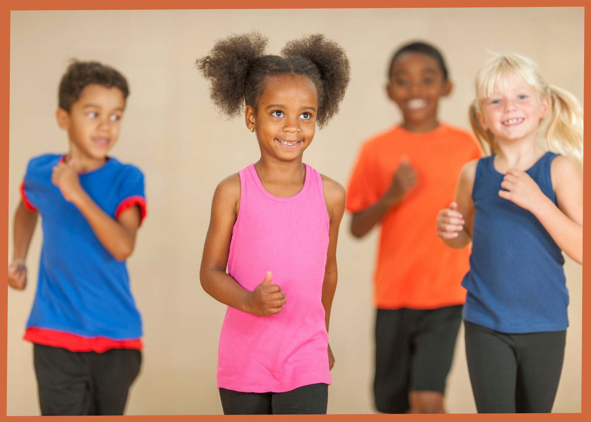 Classic tag game where students are actively chasing each other in a gymnasium, promoting physical activity and engagement.