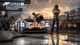 A driver standing in front of their car in Forza Motorsport 7, an Xbox exclusive, highlighting the game's realistic graphics