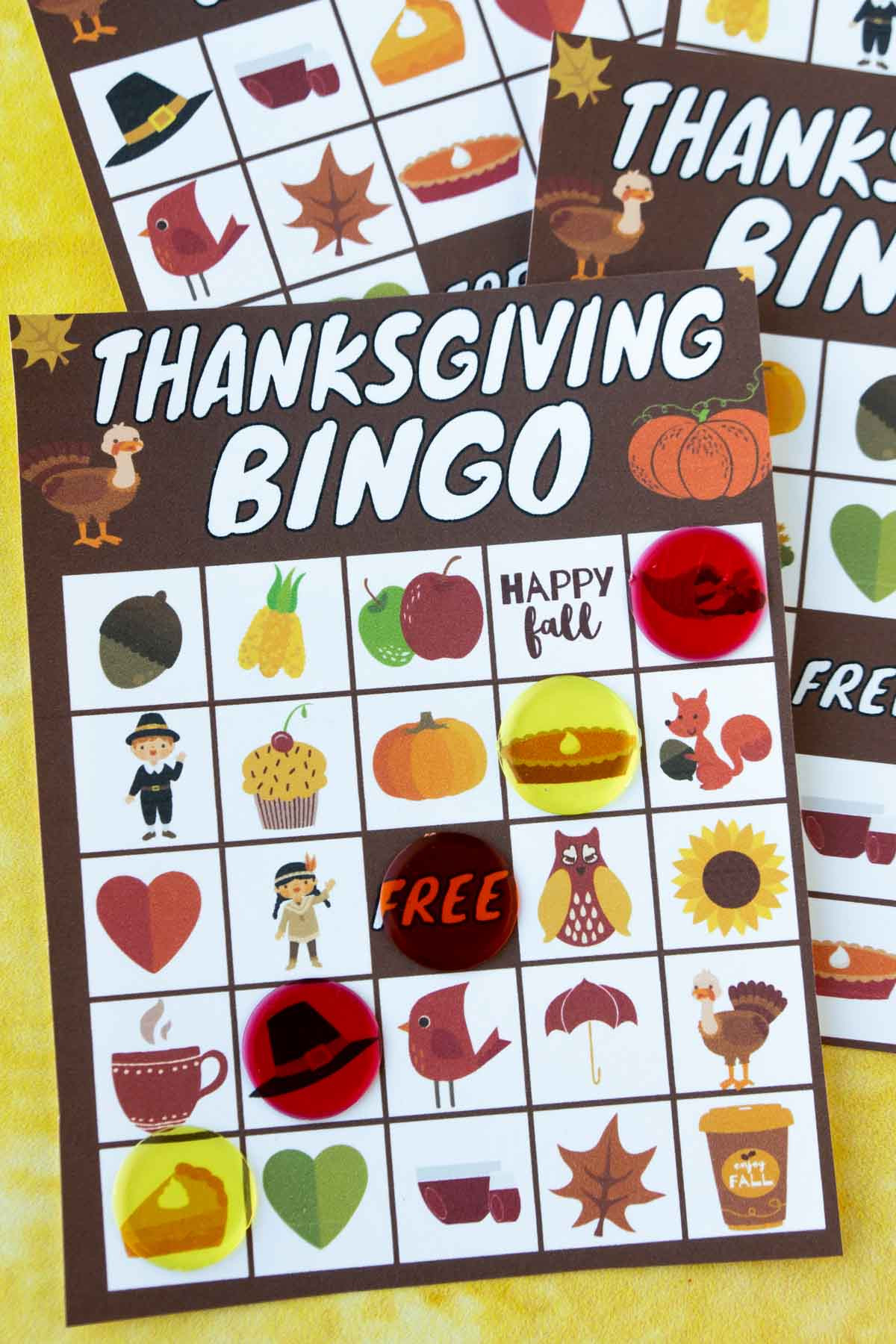 A Thanksgiving-themed bingo card with markers, ready for a festive game